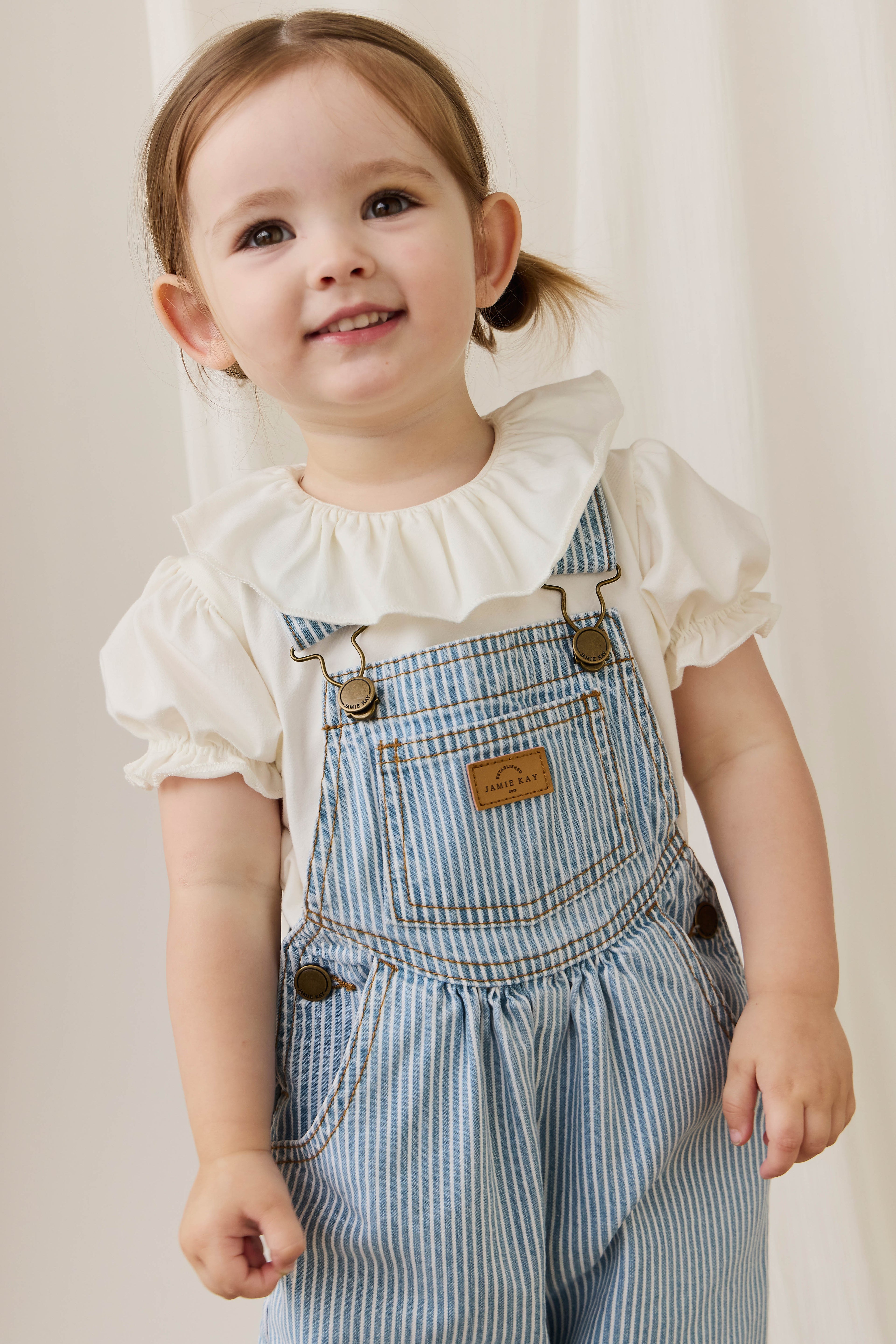 Salopette classique à rayures de Noël en mélange de coton avec bretelles réglables et boutons-pression pour enfants de 6 mois à 8 ans