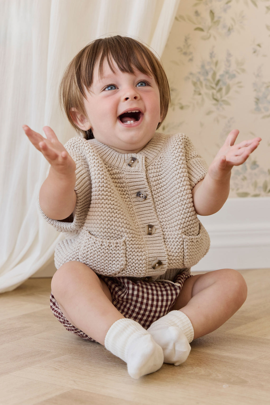 Bloomer-short en coton biologique vichy cannelle, avec taille élastiquée et détail nœud, pour bébés de 0 à 3 ans