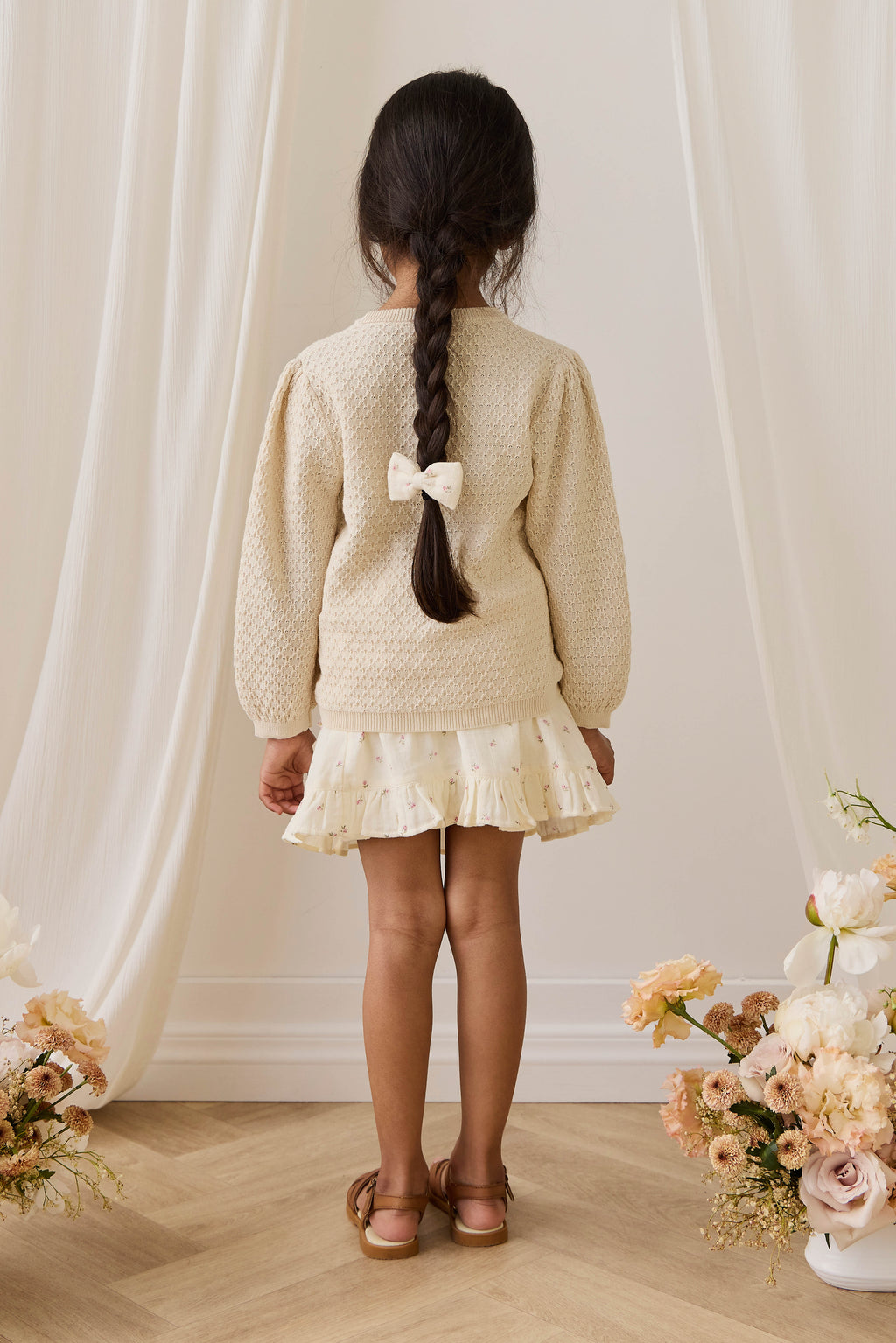 Jupe cache-cœur en mousseline de coton biologique  avec ourlet à volants et nœud latéral pour filles de 1 à 10 ans